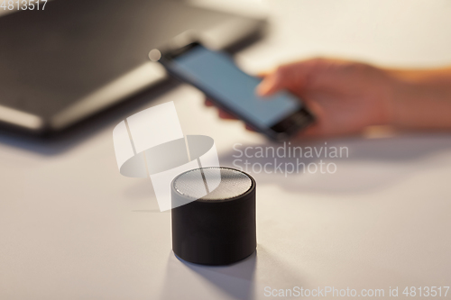 Image of smart speaker on table at office