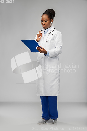 Image of african american female doctor with clipboard