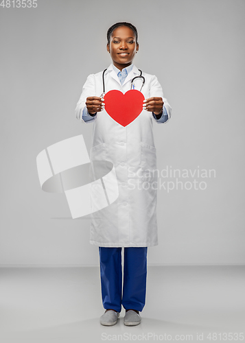 Image of african american female doctor with red heart