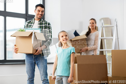 Image of happy family with child moving to new home