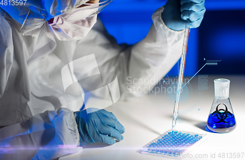 Image of close up of scientist making test in lab