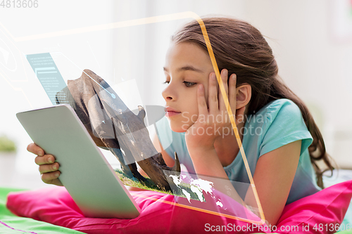Image of girl with tablet pc learning nature online at home