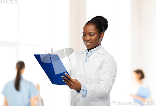 Image of african american female doctor with clipboard