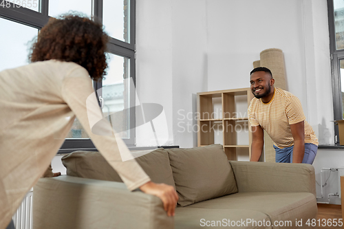 Image of happy couple moving to new home