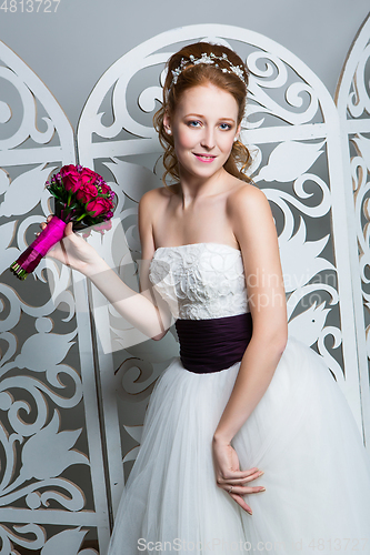 Image of beautiful girl in wedding gown