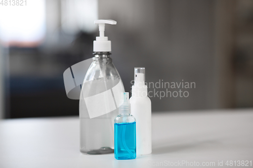 Image of close up of different hand sanitizers on table