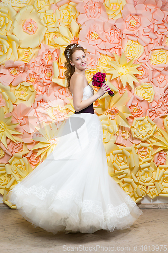 Image of beautiful girl in wedding gown