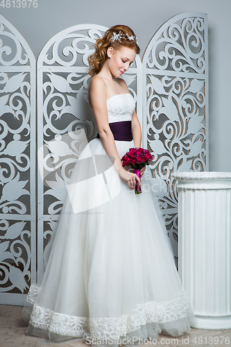 Image of beautiful girl in wedding gown