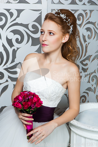 Image of beautiful girl in wedding gown