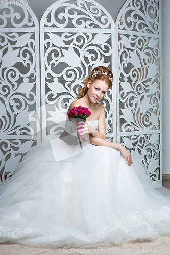 Image of beautiful girl in wedding gown