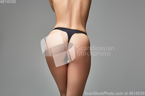 Image of beautiful girl butt on in black panties