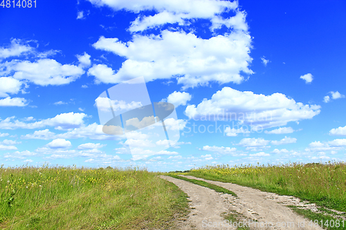 Image of country road and clouds in summer