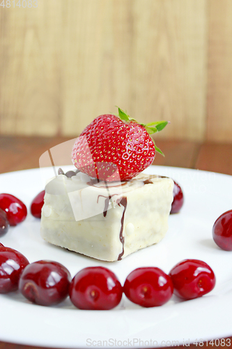 Image of strawberry and cherries with cake