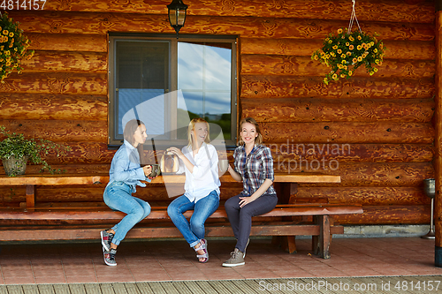 Image of young women drinking tea