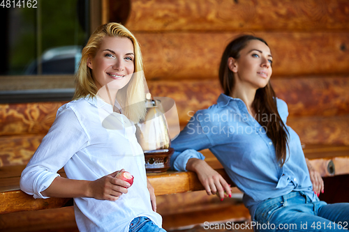 Image of young women drinking tea