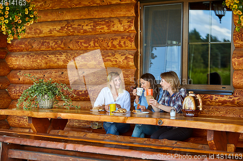 Image of young women drinking tea