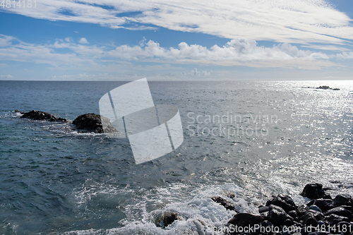 Image of beautiful wild beach with black sand