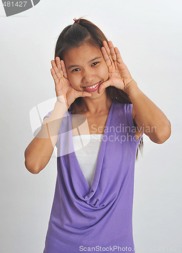 Image of young asian woman framed face