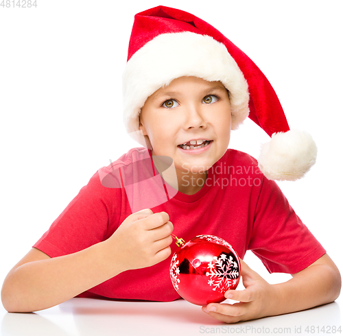 Image of Young happy woman in christmas cloth