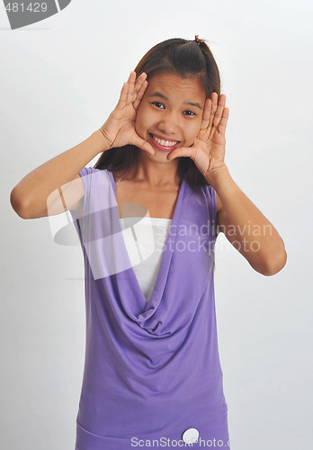 Image of young asian woman framed face