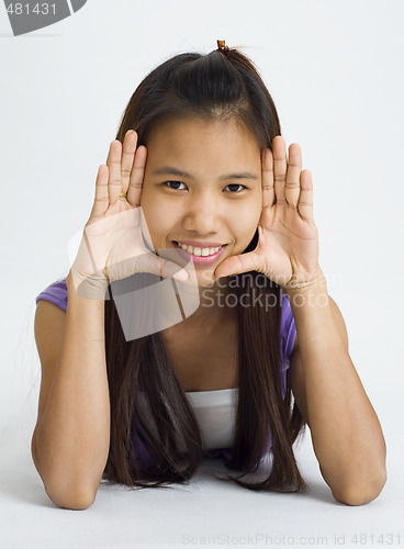 Image of young asian woman framed face