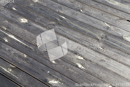 Image of black wooden surface