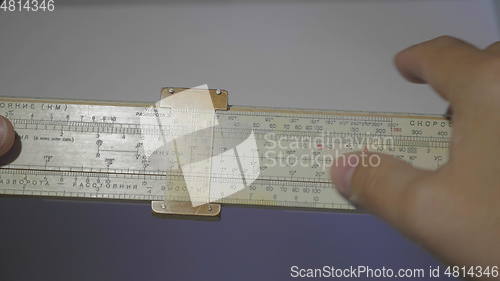 Image of High-precision hand-held calculating tools - logarithmic ruler wooden. UltraHD stock footage