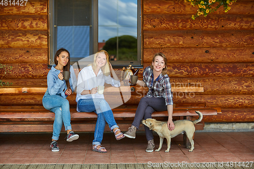 Image of young women drinking tea