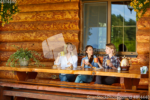 Image of young women drinking tea