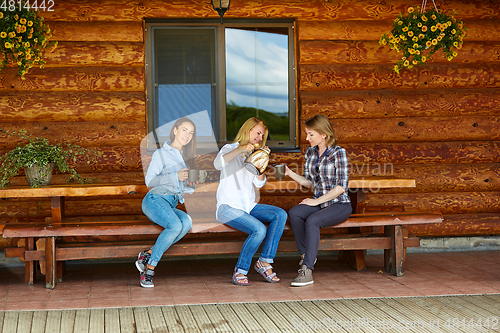 Image of young women drinking tea