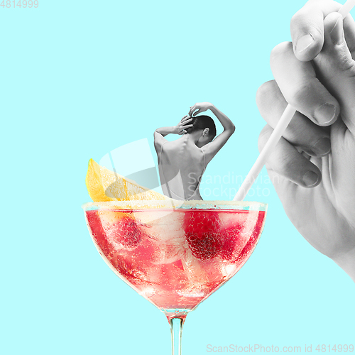 Image of Contemporary art collage, modern design. Summer mood. Tender ballerina sitting on giant cocktail glass with berry drink