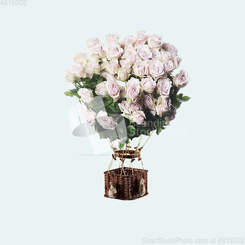 Image of Contemporary art collage, modern design. Summer mood. Balloon with bouquet of tender white roses on light blue