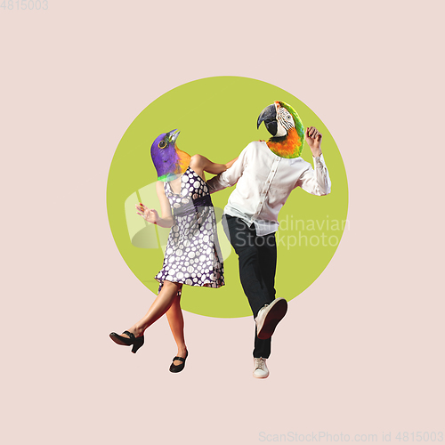Image of Contemporary art collage, modern design. Summer mood. Couple of dancers headed with birds heads dancing on bright
