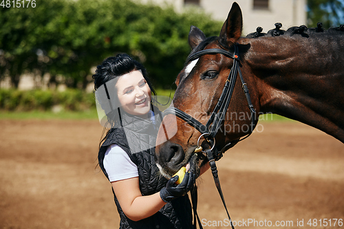 Image of beautiful girl with horse