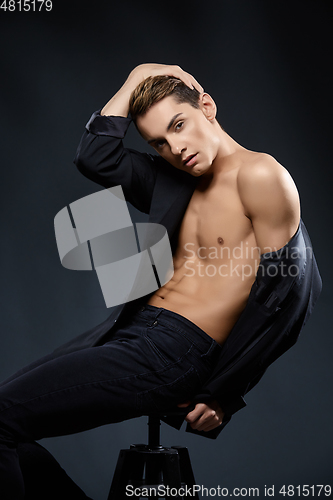 Image of handsome young man in black jacket