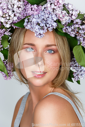 Image of beautiful girl with flower wreath on head