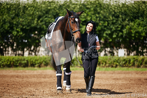 Image of beautiful girl with horse