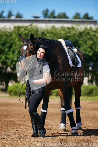 Image of beautiful girl with horse