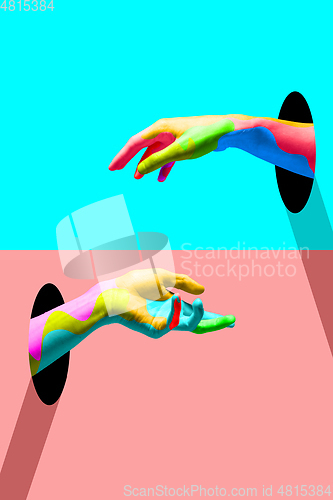 Image of Contemporary art collage, modern design. Party mood. Bright colored hands catching each other.