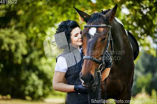 Image of beautiful girl with horse