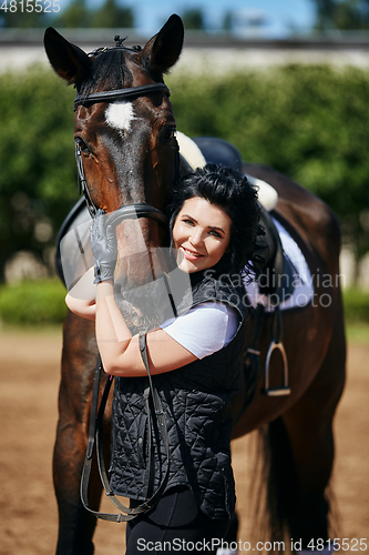 Image of beautiful girl with horse