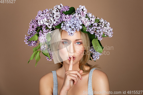 Image of beautiful girl with flower wreath on head