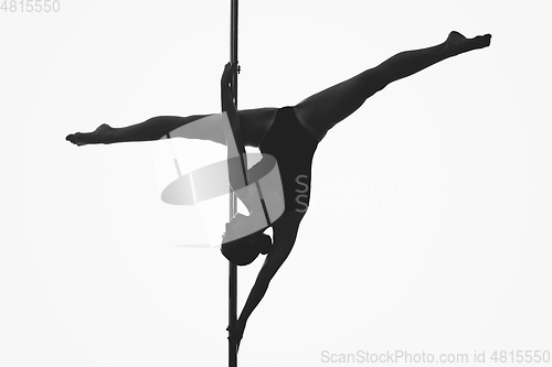 Image of beautiful pole dancer girl silhouette