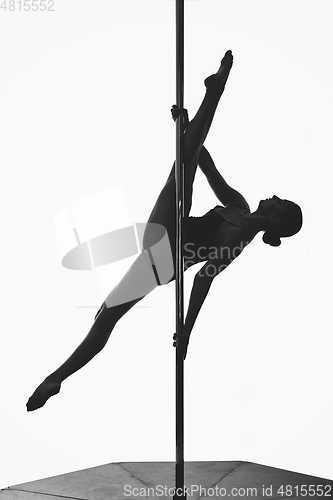 Image of beautiful pole dancer girl silhouette