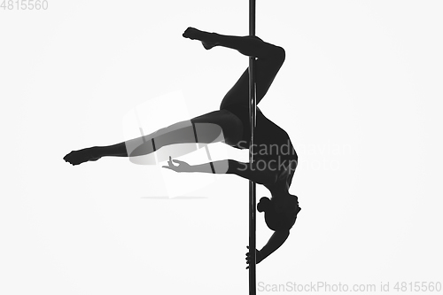 Image of beautiful pole dancer girl silhouette