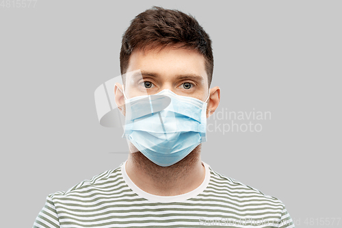 Image of young man in protective medical mask