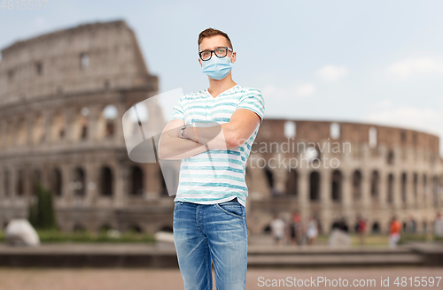 Image of man wearing protective medical mask in italy