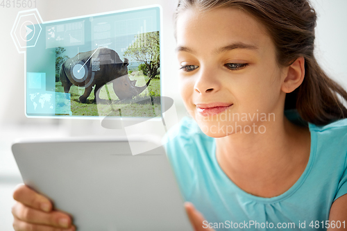 Image of girl with tablet pc learning nature online at home