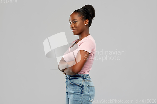 Image of confident african american woman with crossed arms