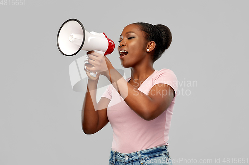 Image of african american woman over grey background